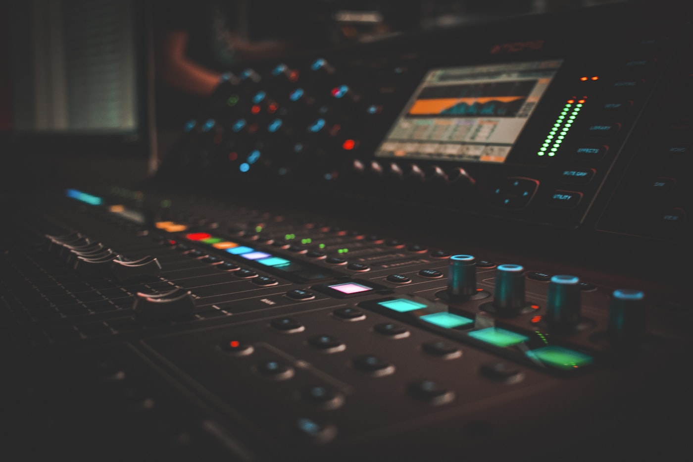 DJ mixer with neon-lit controls