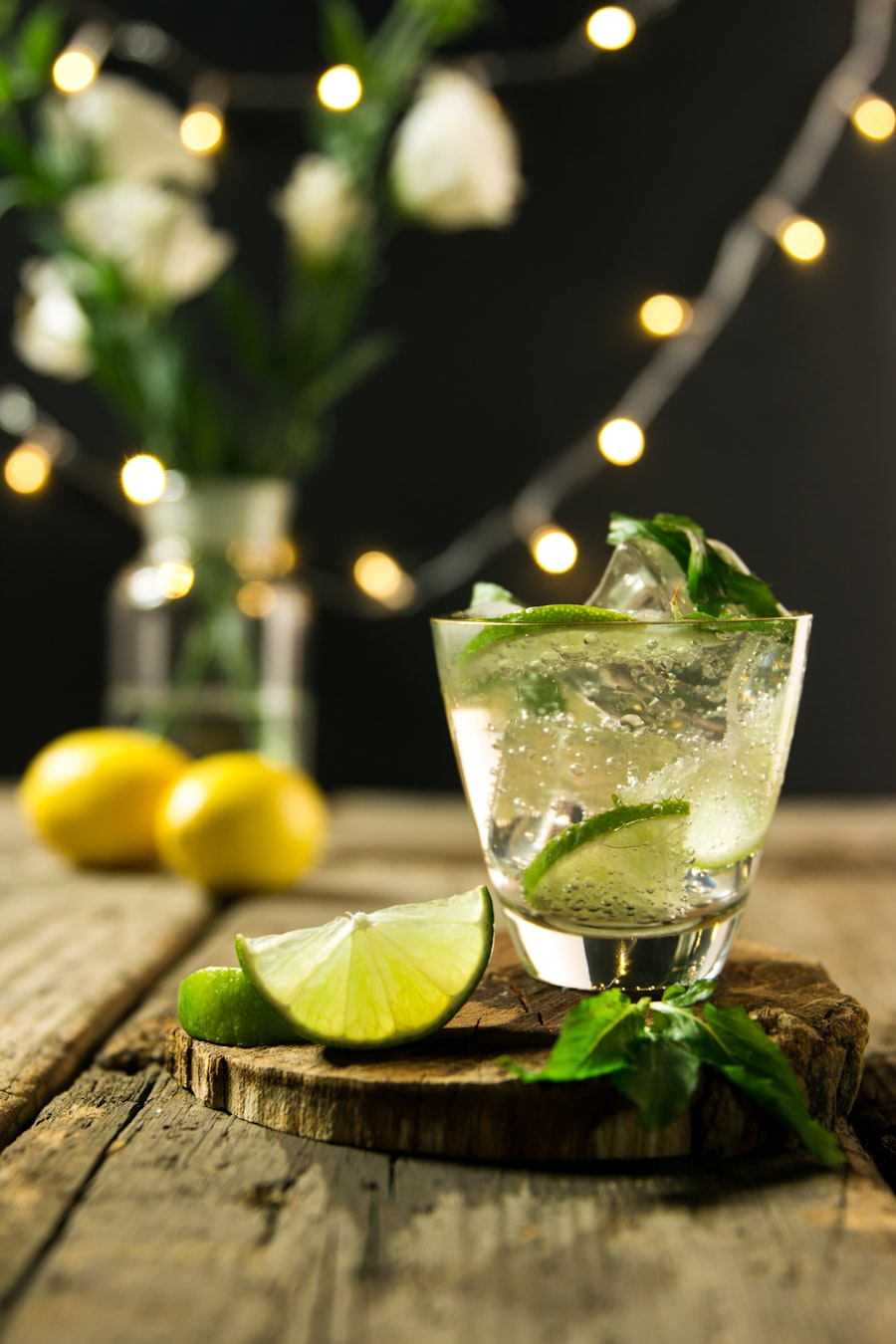 Mojito with lime on wood bar top